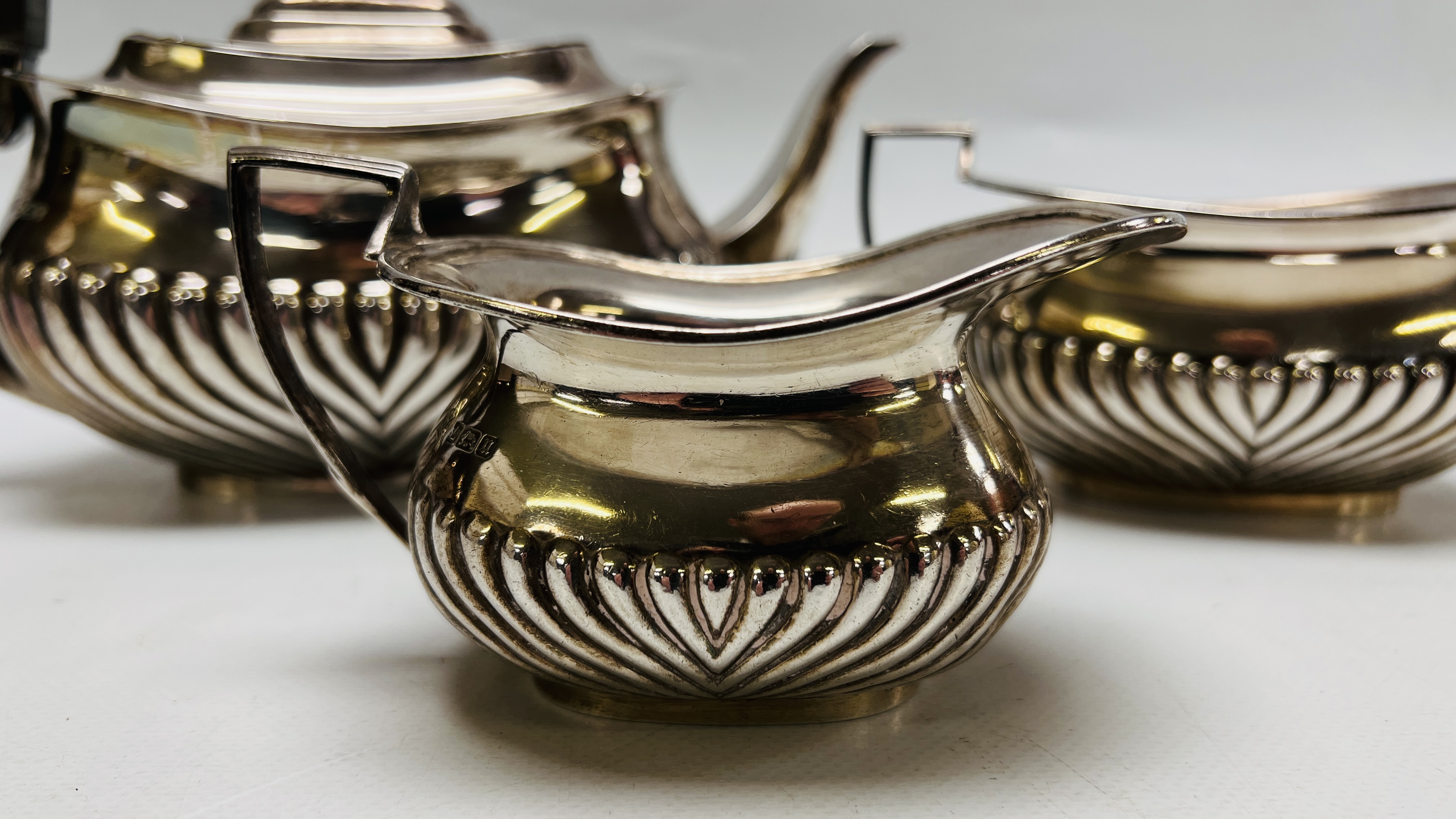 A THREE PIECE SILVER TEASET OF DRAGOONED DESIGN SHEFFIELD 1912 - Image 2 of 15