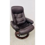 A BROWN LEATHER RELAXER CHAIR