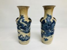 A PAIR OF CHINESE BLUE AND WHITE VASES OF SHOULDERED CYLINDRICAL FORM,