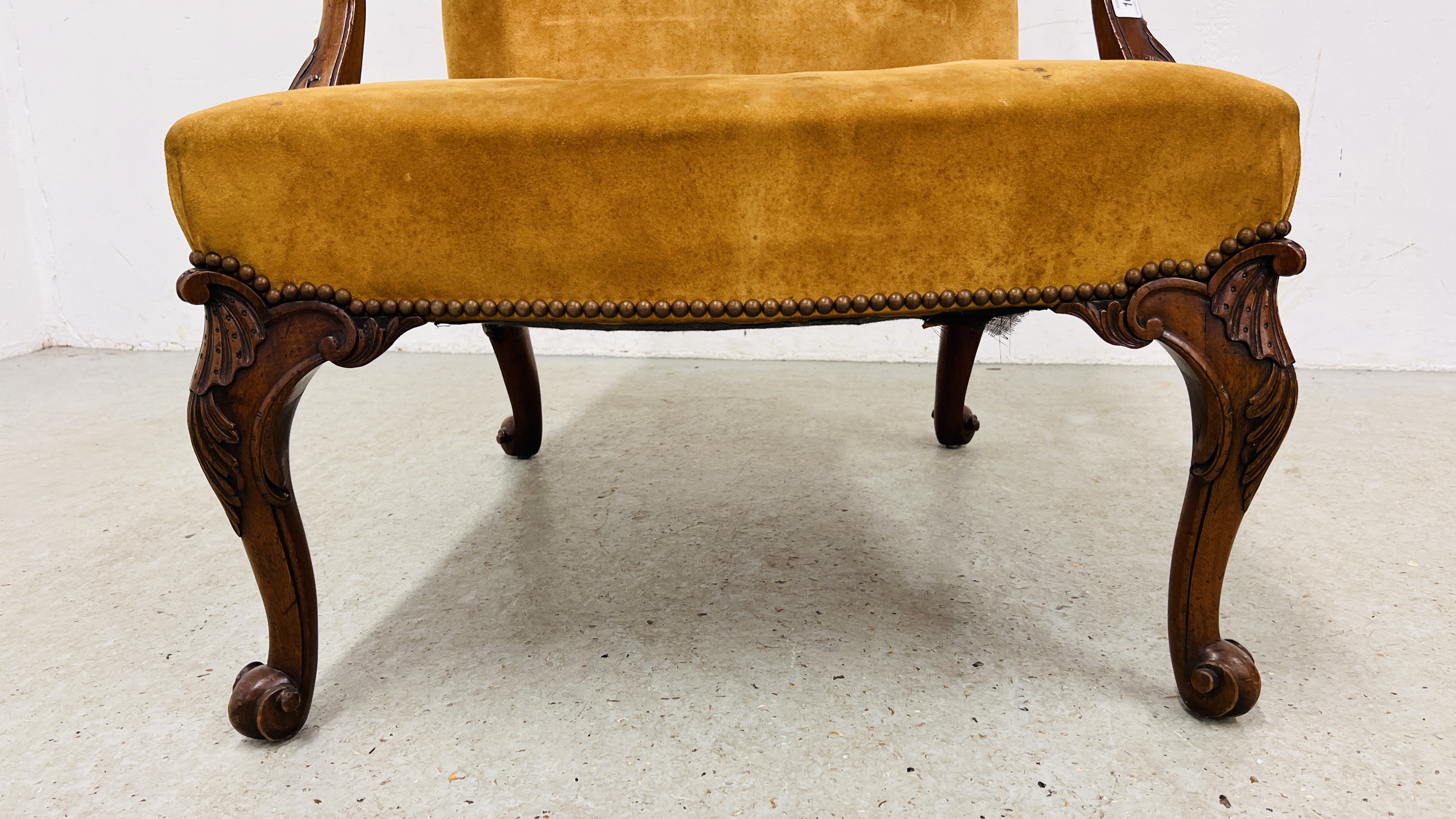 A GEORGE III GAINSBOROUGH CHAIR NOW COVERED IN LEATHER ON CABRIOLE LEGS TERMINATING IN SCROLL FEET. - Image 9 of 12