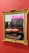 A GILT MIRROR IN MID C18TH STYLE WITH OUTSET CORNERS (LATER PLATE) HEIGHT 101CM.