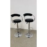 A PAIR OF CHROME FINISH RISE AND FALL BAR STOOLS