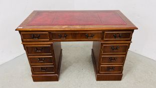 A REPRODUCTION THREE DRAWER TWIN PEDESTAL DESK WITH TOOLED LEATHER INSERT AND DRAWERS TO BASE