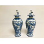 A PAIR OF CHINESE BLUE AND WHITE BALLUSTER VASES AND COVERS C.1800 A/F HEIGHT 28CM.