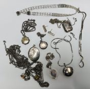 A GROUP OF FOUR SILVER PHOTO LOCKETS AND CHAINS ALONG WITH AN OVAL SILVER PHOTO LOCKET A/F AND