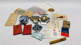 A GROUP OF FOUR VINTAGE CAR BADGES TO INCLUDE AA AND RAC ALONG WITH A QUANTITY OF MOTORING EPHEMERA