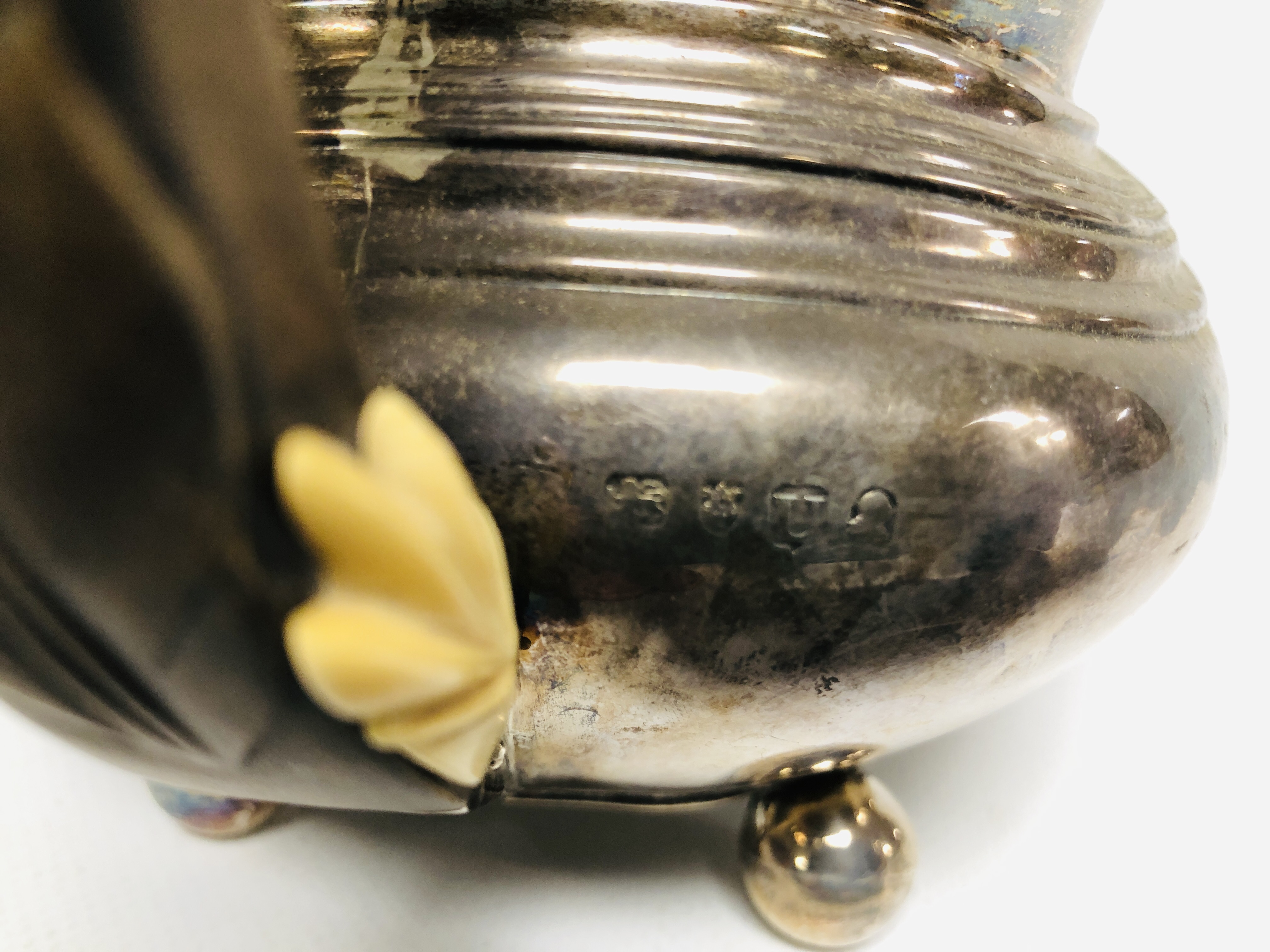 A GEORGE III SILVER TEAPOT, LONDON ASSAY OF COMPRESSED OVOID FORM ON BALL FEET. - Image 6 of 9