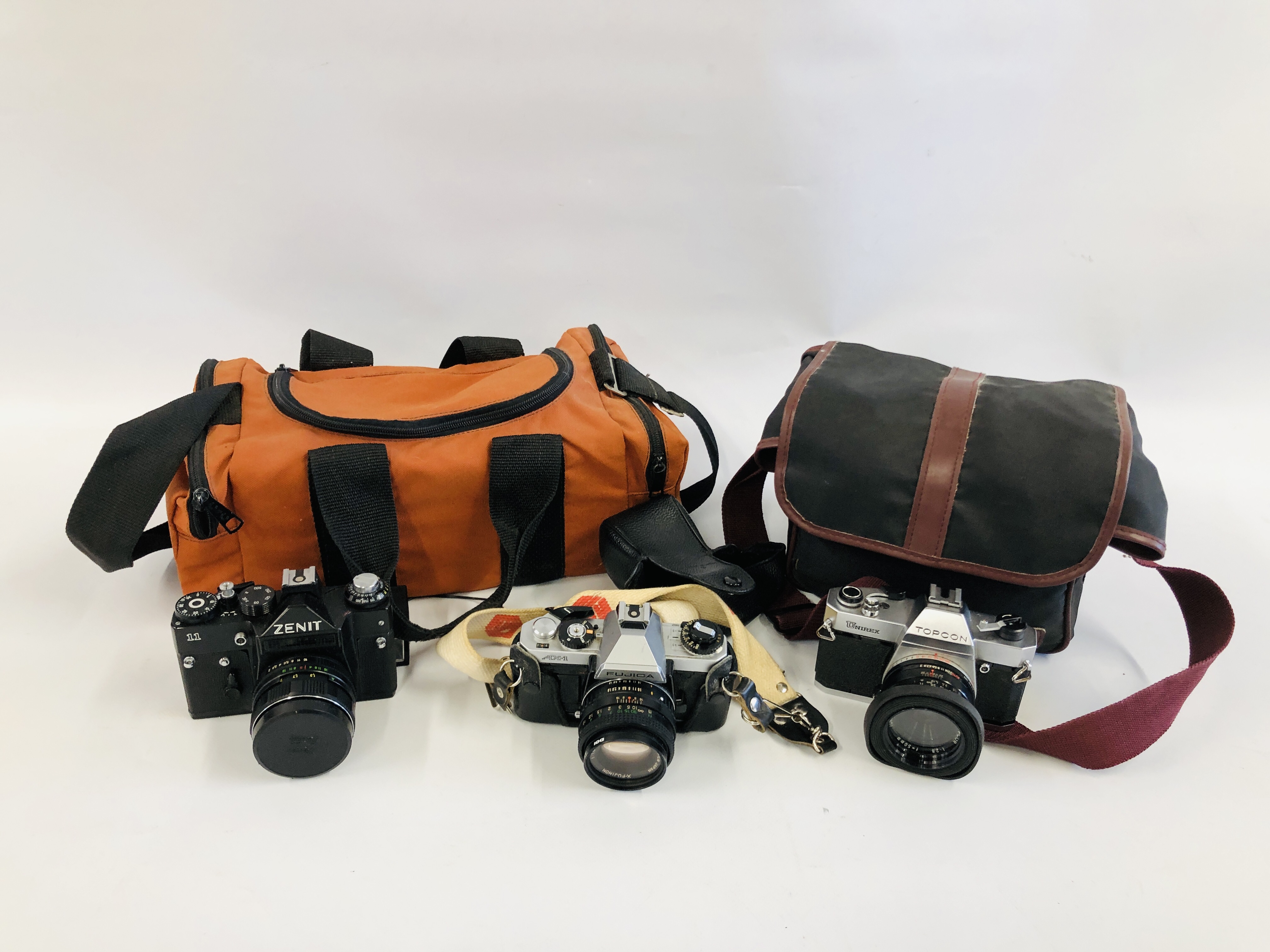 QUANTITY OF CAMERA EQUIPMENT TO INCLUDE ZENIT 11 CAMERA BODY, TOPCON UNIVEX CAMERA BODY,