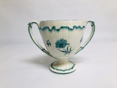 A WEDGWOOD CREAMWARE TWO HANDLED CUP DECORATED IN GREEN A/F HEIGHT 17CM.
