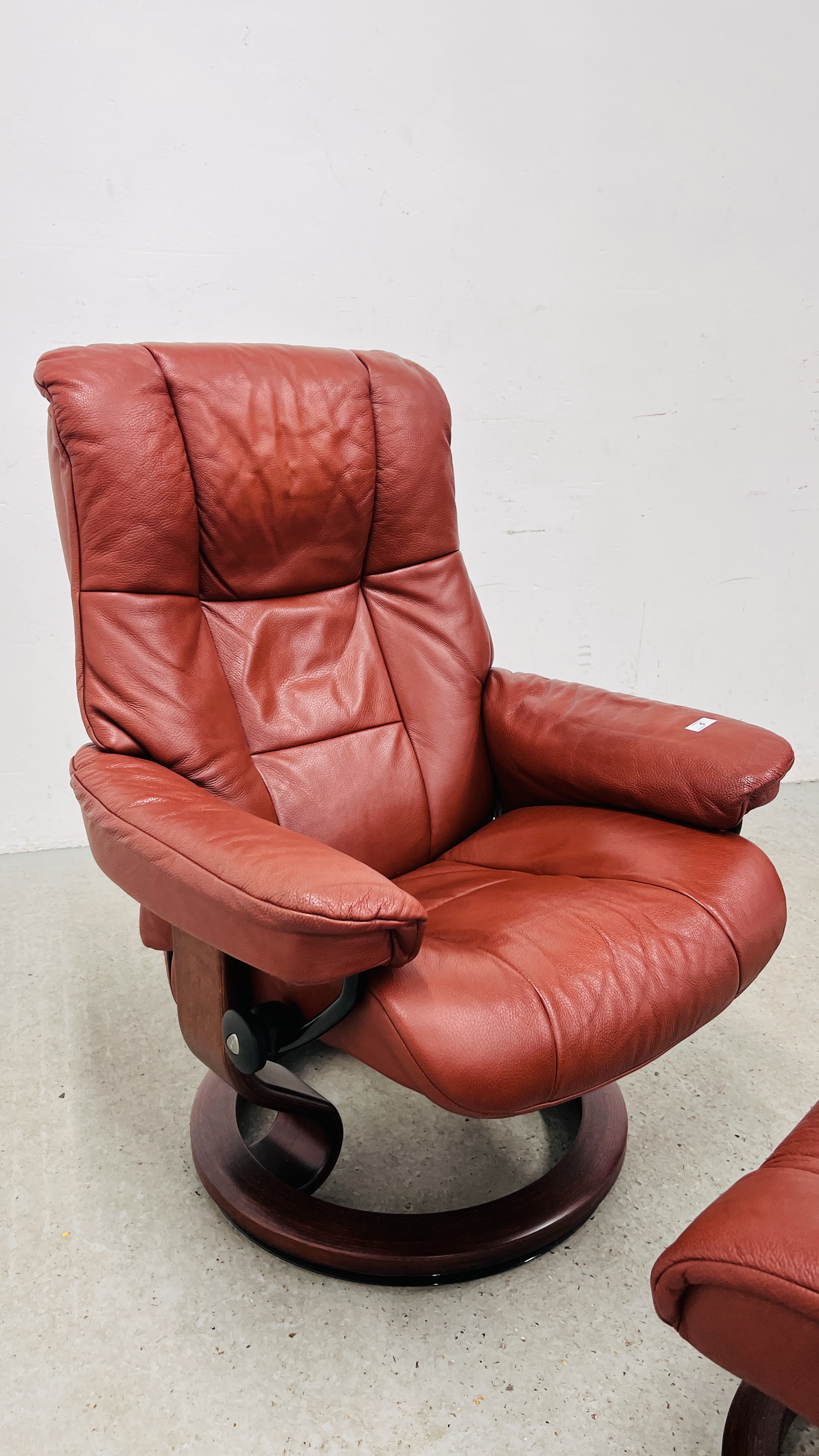 A GOOD QUALITY STRESSLESS RED LEATHER RELAXER CHAIR WITH MATCHING FOOTSTOOL. - Image 10 of 13