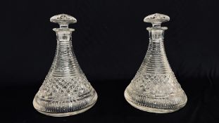 A PAIR OF SHIPS DECANTERS WITH HOBNAIL CUT BODIES AND MUSHROOM STOPPERS HEIGHT 25CM.