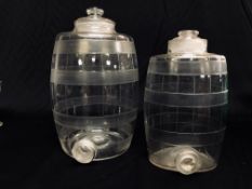 TWO C19th GLASS SPIRIT BARRELS OF CIRCULAR AND OVOID FORM, HEIGHT 32CM AND 26CM.