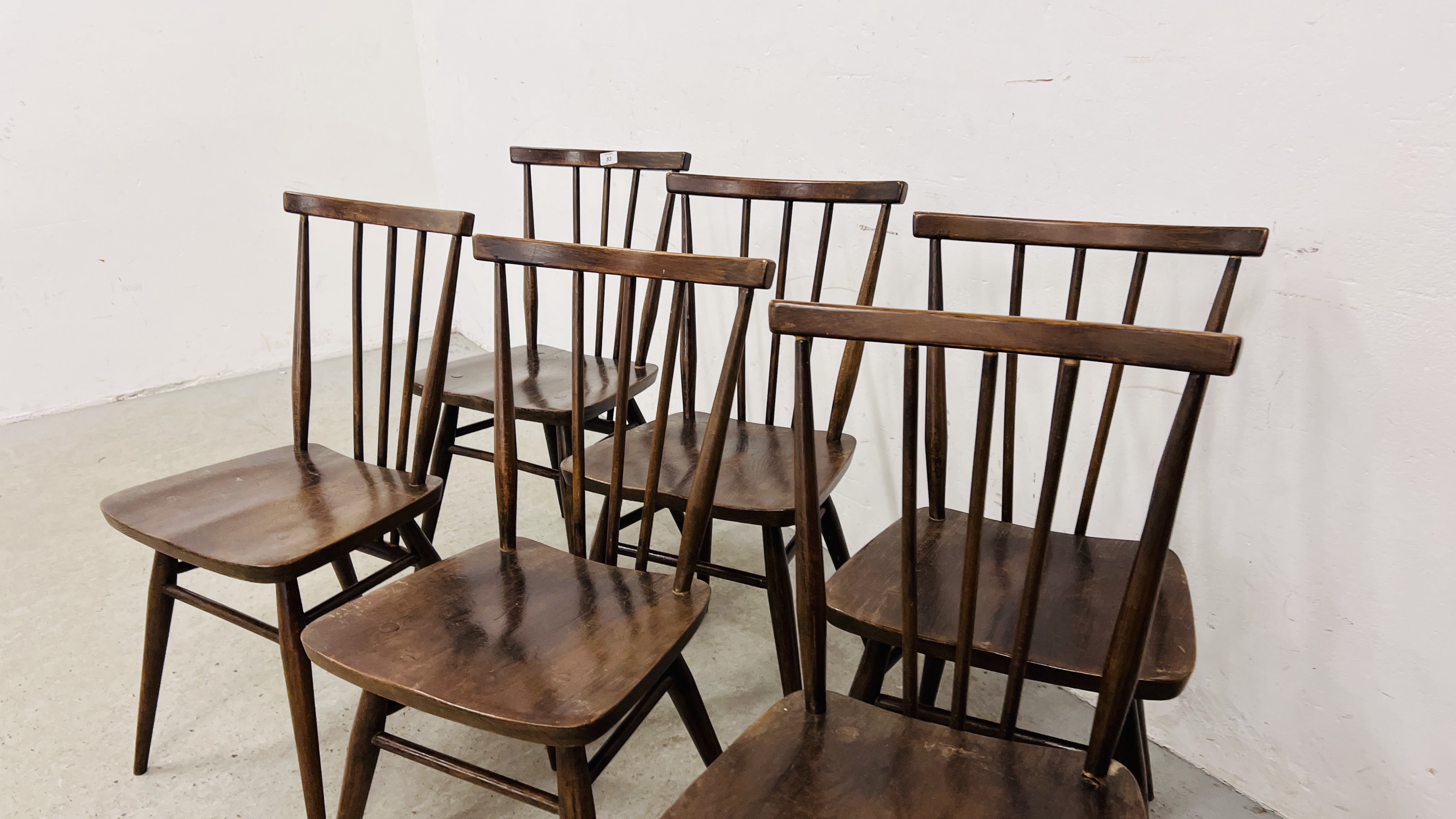 A SET OF SIX DARK ERCOL STICK BACK DINING CHAIRS, 1 A/F. - Image 8 of 17