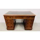 A VICTORIAN MAHOGANY NINE DRAWER PEDESTAL DESK WITH INSET LEATHER TOP WIDTH 121CM. DEPTH 65CM.