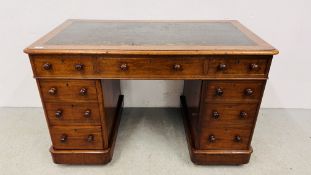 A VICTORIAN MAHOGANY NINE DRAWER PEDESTAL DESK WITH INSET LEATHER TOP WIDTH 121CM. DEPTH 65CM.