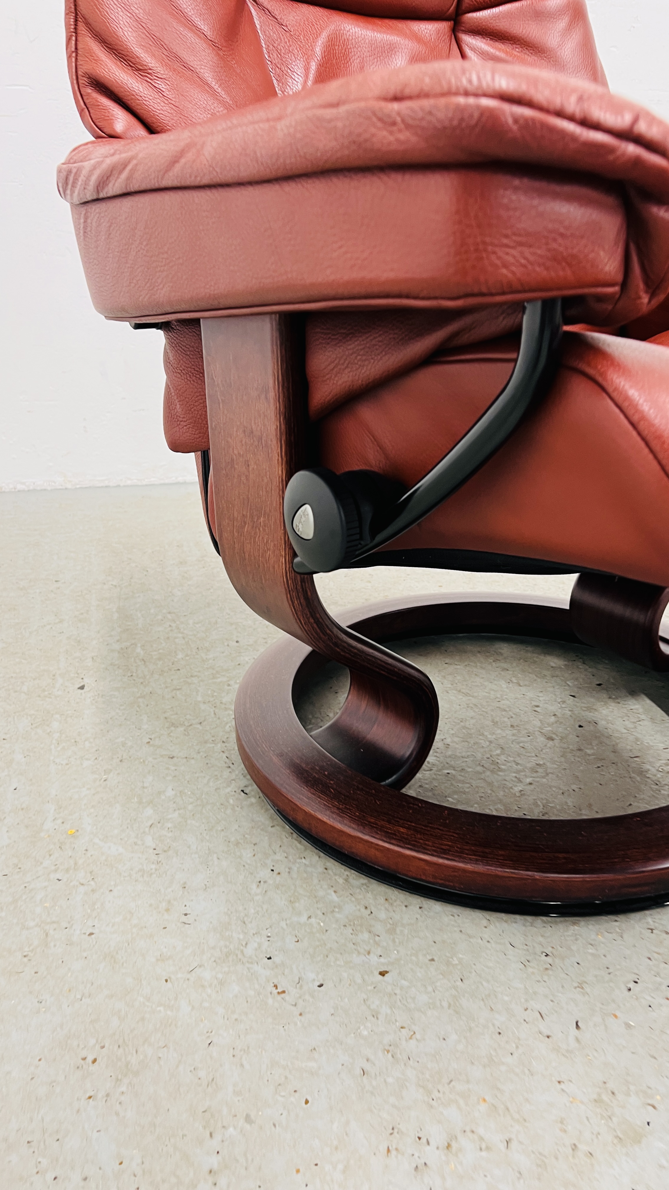 A GOOD QUALITY STRESSLESS RED LEATHER RELAXER CHAIR WITH MATCHING FOOTSTOOL. - Image 11 of 13