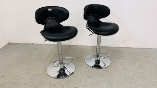 A PAIR OF CHROME FINISH RISE AND FALL BAR STOOLS