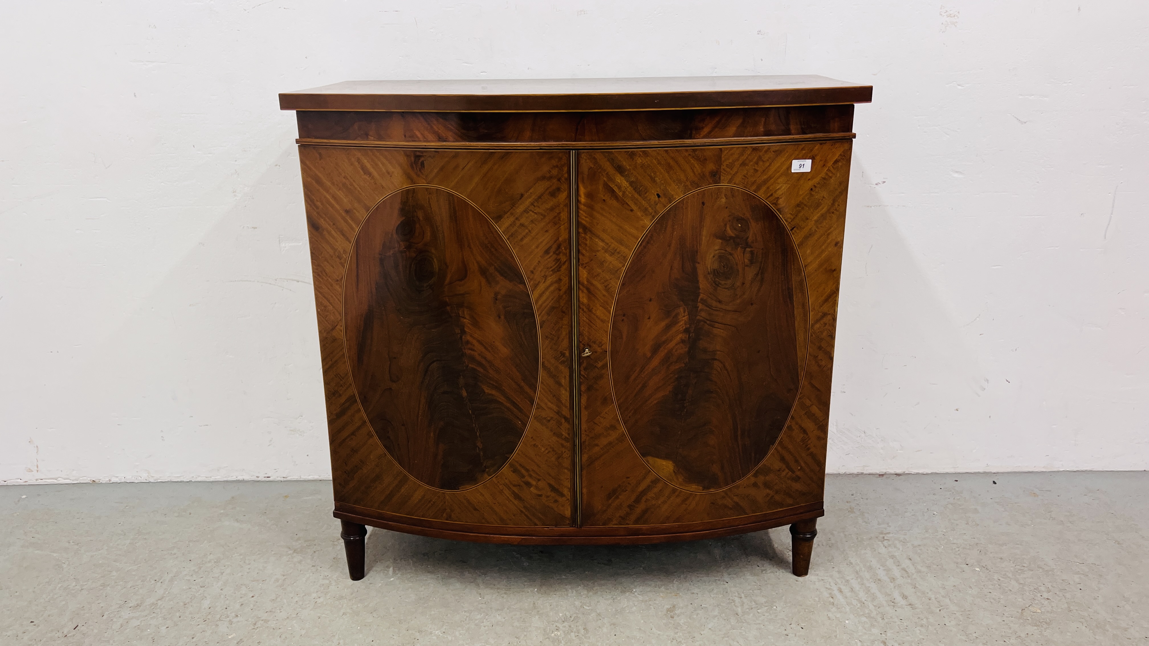 A C19TH. BOW FRONTED TWO DOOR CABINET IN LATE C18TH. STYLE WIDTH 104CM. - Image 5 of 16