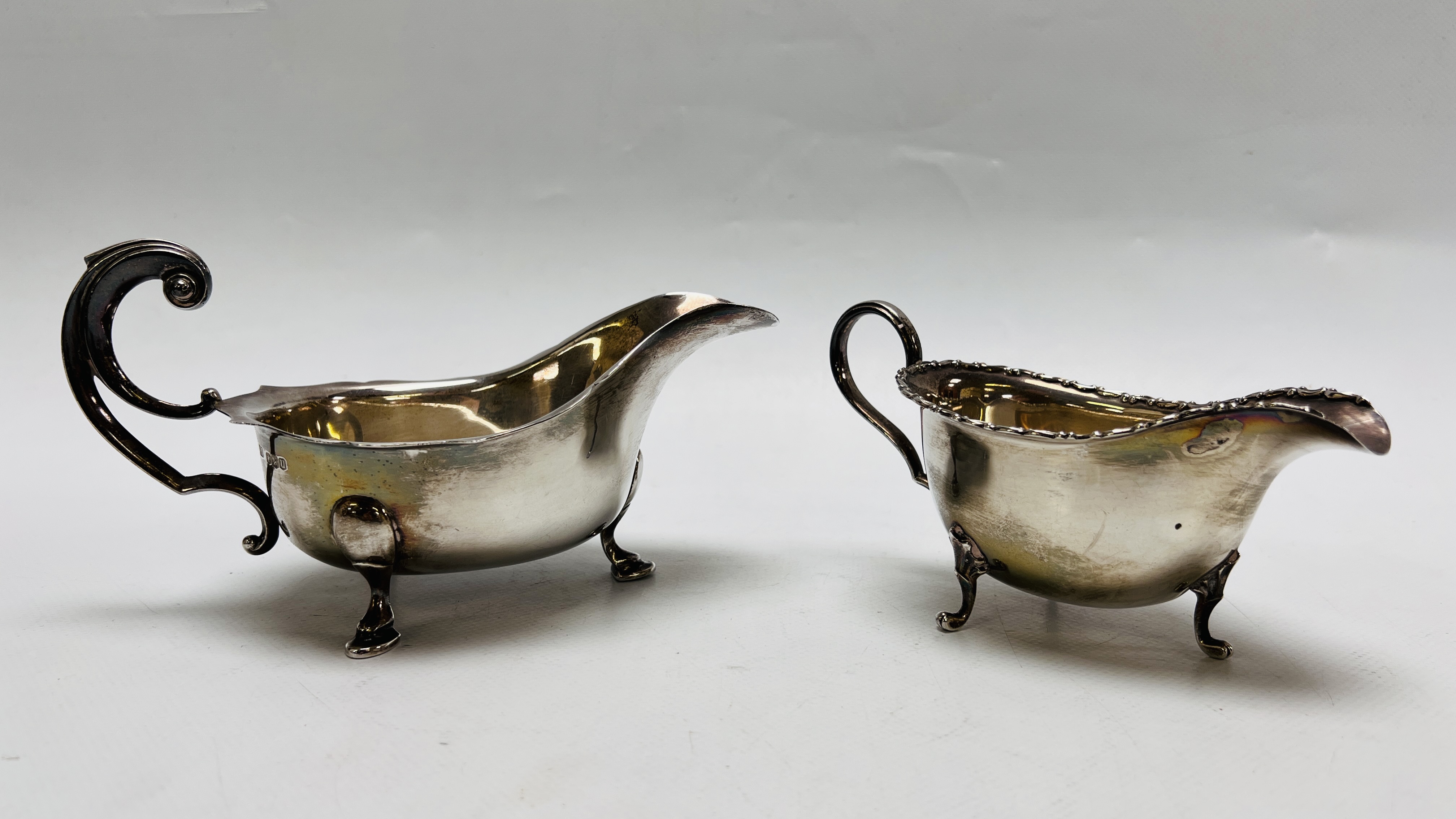 TWO SILVER SAUCE BOATS IN THE C18TH.