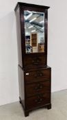 A GEORGE III AND LATER MIRRORED CUPBOARD ON CHEST HEIGHT 173CM. WIDTH 48CM. DEPTH 42CM.