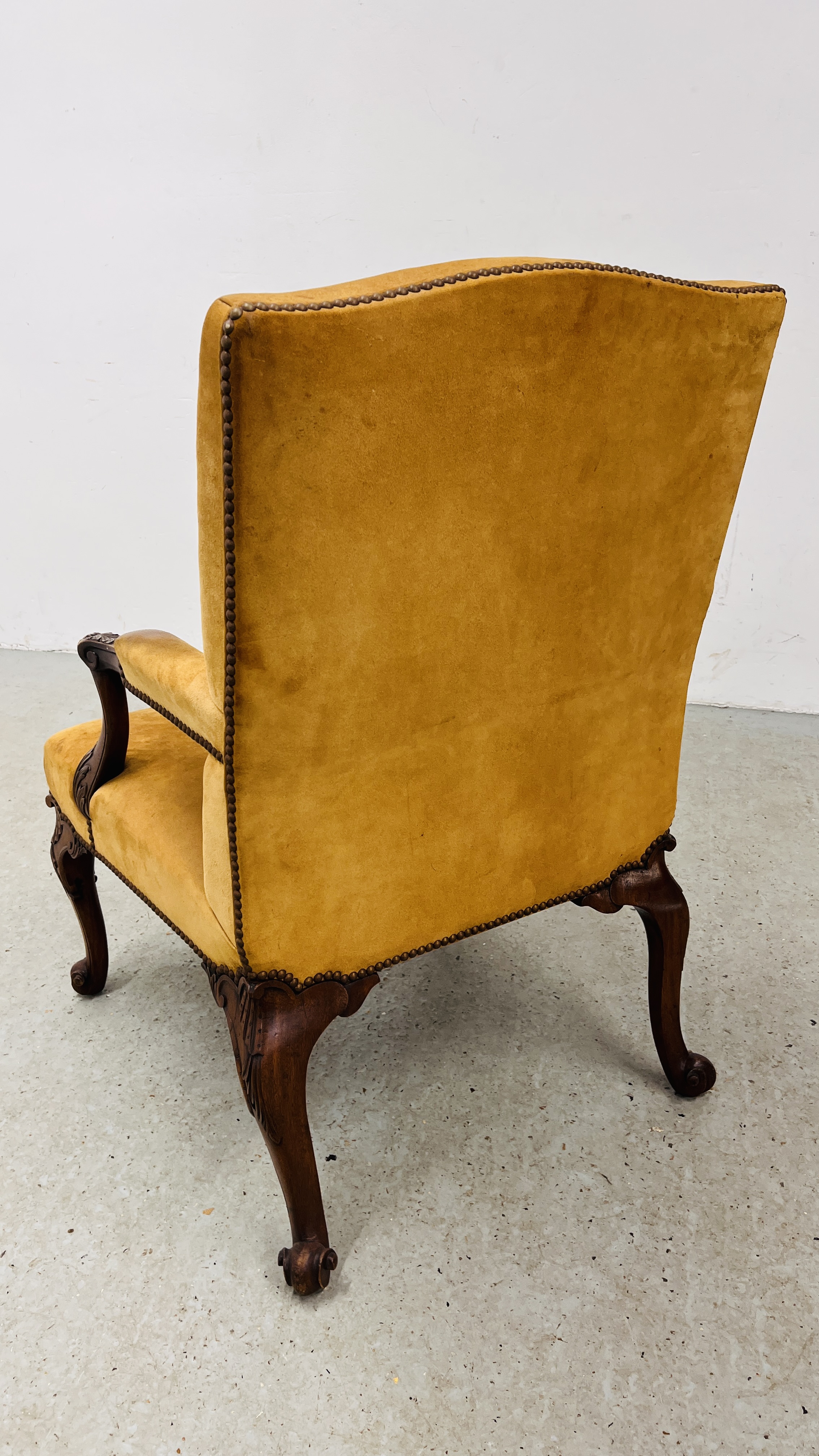 A GEORGE III GAINSBOROUGH CHAIR NOW COVERED IN LEATHER ON CABRIOLE LEGS TERMINATING IN SCROLL FEET. - Image 12 of 12