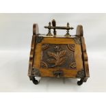 A WALNUT COAL BOX WITH CARVED PANEL DETAILING,