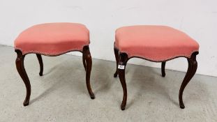 A PAIR OF VICTORIAN MAHOGANY STOOLS ON FRENCH CABRIOLE LEGS, PINK LINEN SEAT COVER.