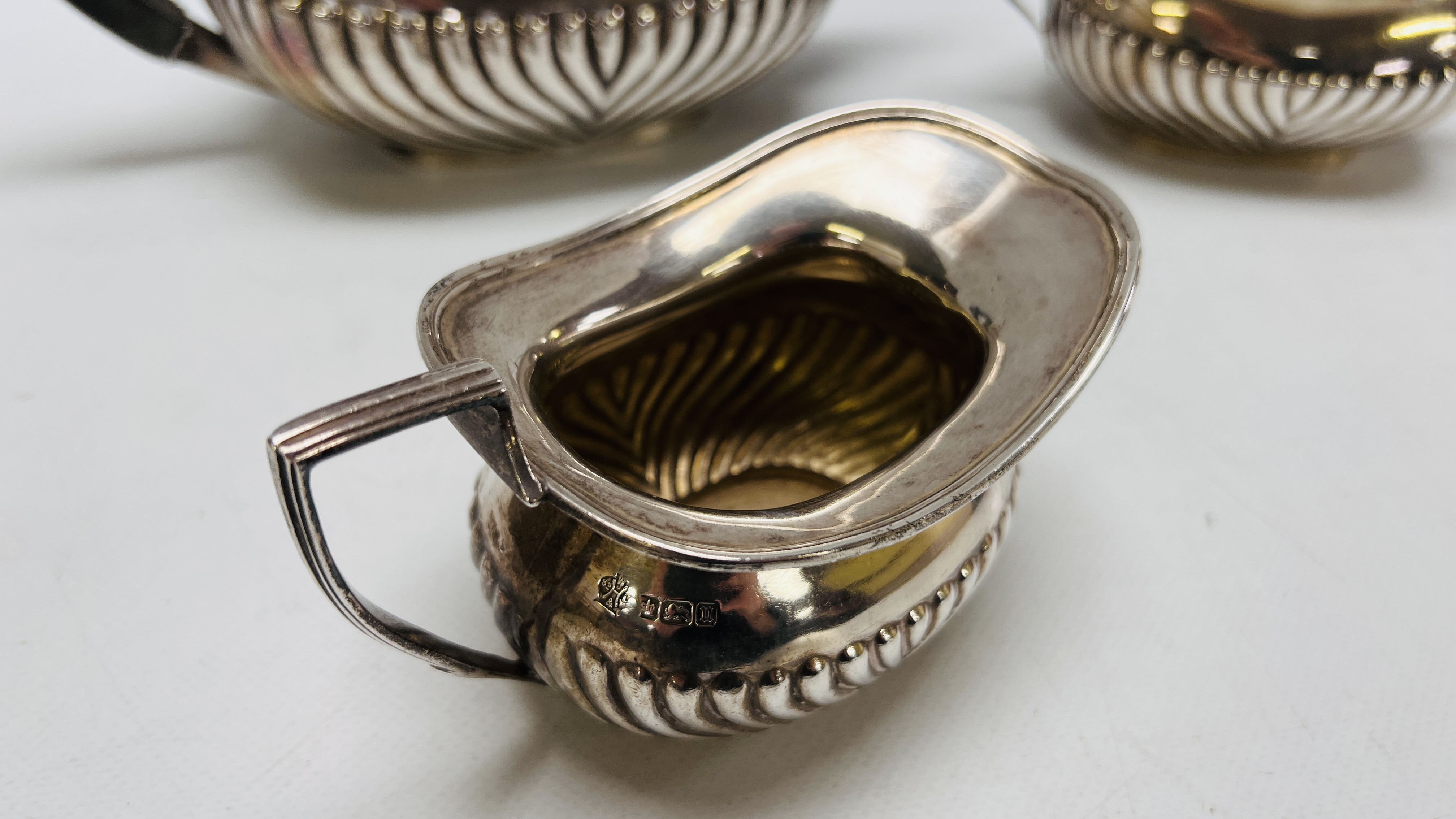 A THREE PIECE SILVER TEASET OF DRAGOONED DESIGN SHEFFIELD 1912 - Image 7 of 15