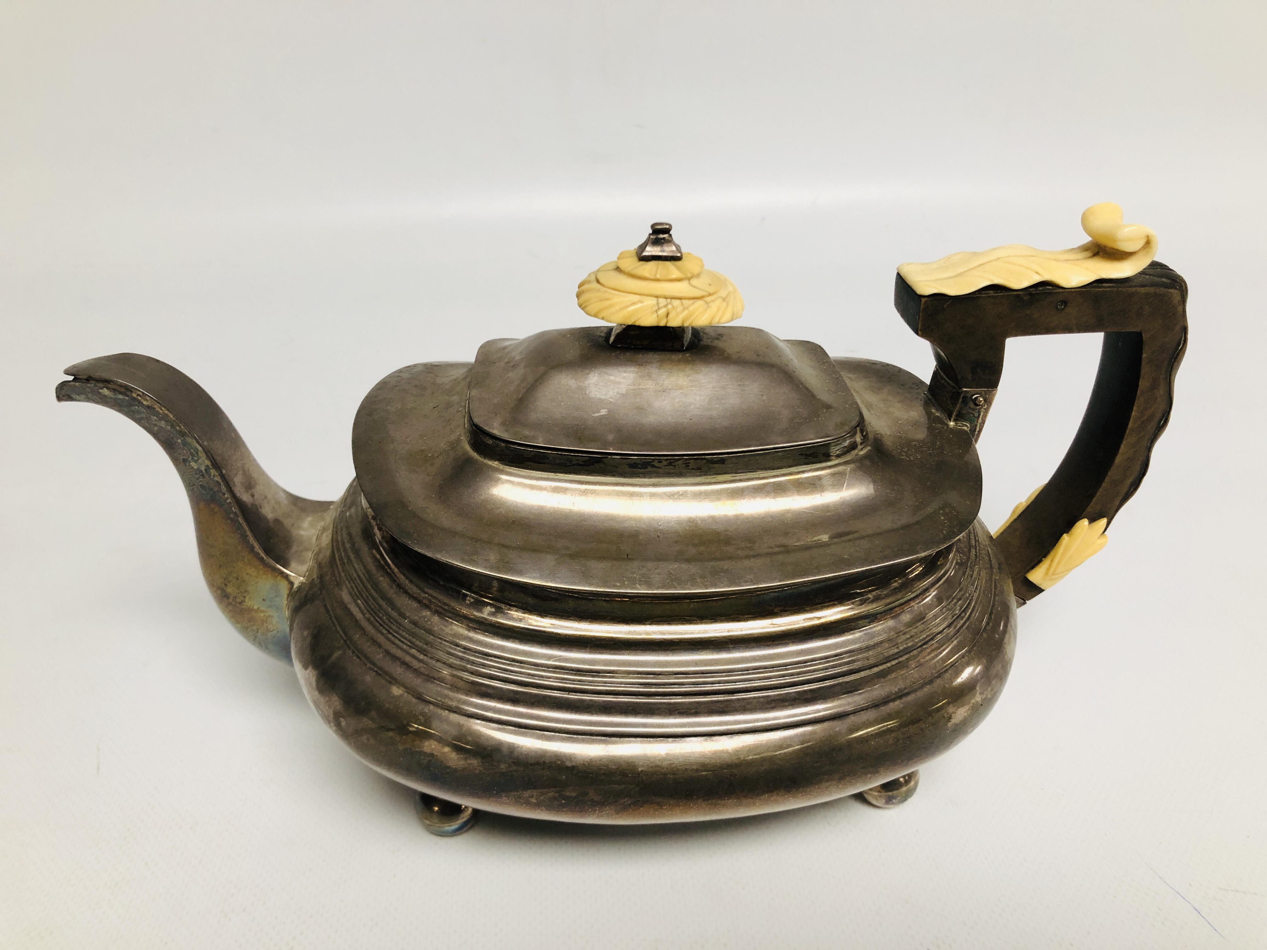 A GEORGE III SILVER TEAPOT, LONDON ASSAY OF COMPRESSED OVOID FORM ON BALL FEET. - Image 2 of 9