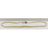 A VINTAGE SILVER STRAND PEARL NECKLACE LENGTH 40CM.