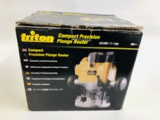 BOXED TRITON COMPACT PRECISION 1010W PLUNGE ROUTER - SOLD AS SEEN.