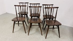 A SET OF SIX DARK ERCOL STICK BACK DINING CHAIRS, 1 A/F.