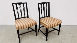 A PAIR OF GEORGE III MAHOGANY DINING CHAIRS IN HEPPLEWHITE STYLE (PINK STRIPED SEATS)