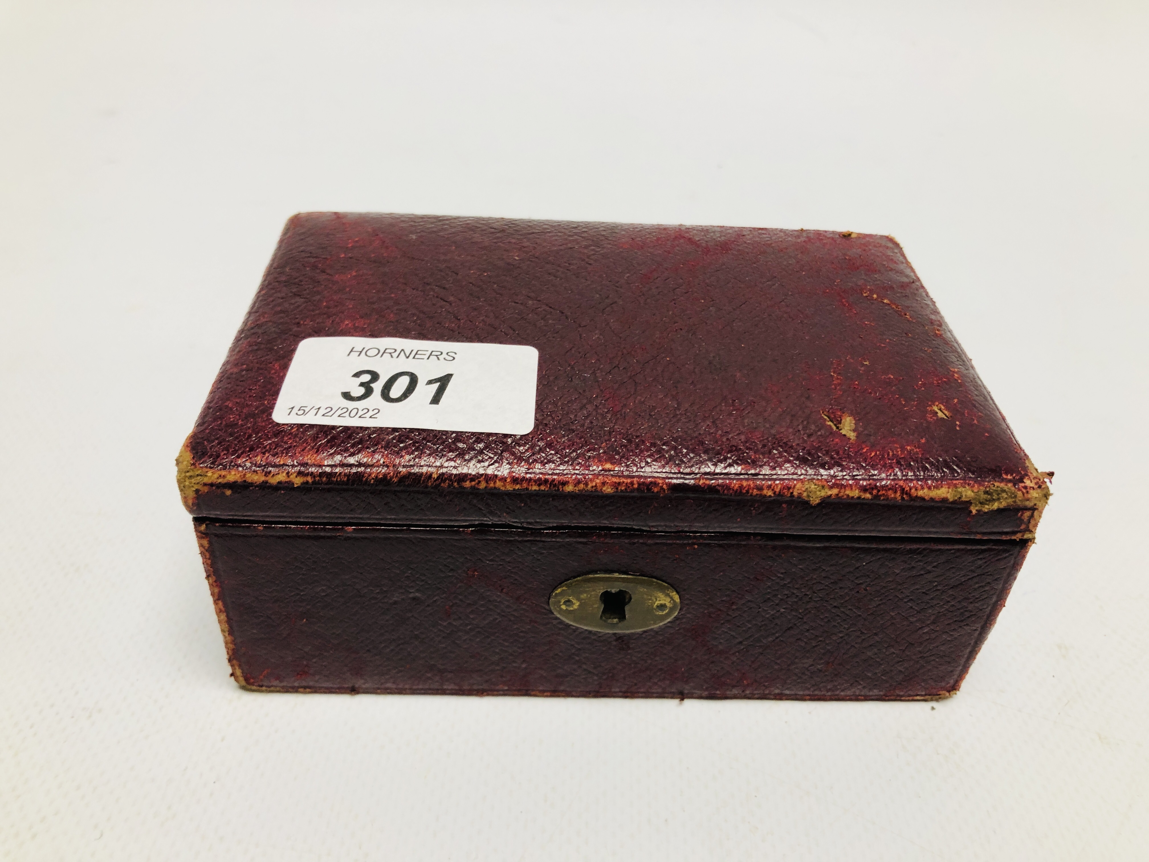 VINTAGE LEATHER BOUND JEWELLERY BOX AND CONTENTS TO INCLUDE MINIATURE ANIMALS, EBONY AND GILT RING, - Image 10 of 10