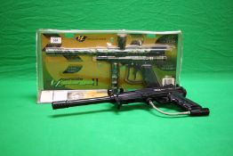A BOXED GENISIS SURGE 2 PAINTBALL GUN .50 CAL AND PCS .