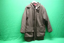 A GOOD QUALITY SHOOTING JACKET WITH CHECK LINER