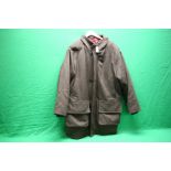 A GOOD QUALITY SHOOTING JACKET WITH CHECK LINER