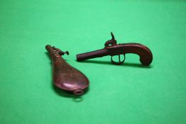 AN ANTIQUE PERCUSSION CAP WESTWOOD LONDON PISTOL AND LEATHER POWDER FLASK A/F - (COLLECTORS ITEM