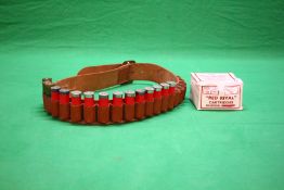 BRADY 12 GAUGE LEATHER CARTRIDGE BELT ALONG WITH 12 X ELEY KYNOCH 12 GAUGE CARTRIDGES AND 3 X