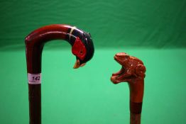 2 X HAND CRAFTED SHOOTING STICKS WITH CARVED AND PAINTED ANIMALS - FROG AND PHEASANT