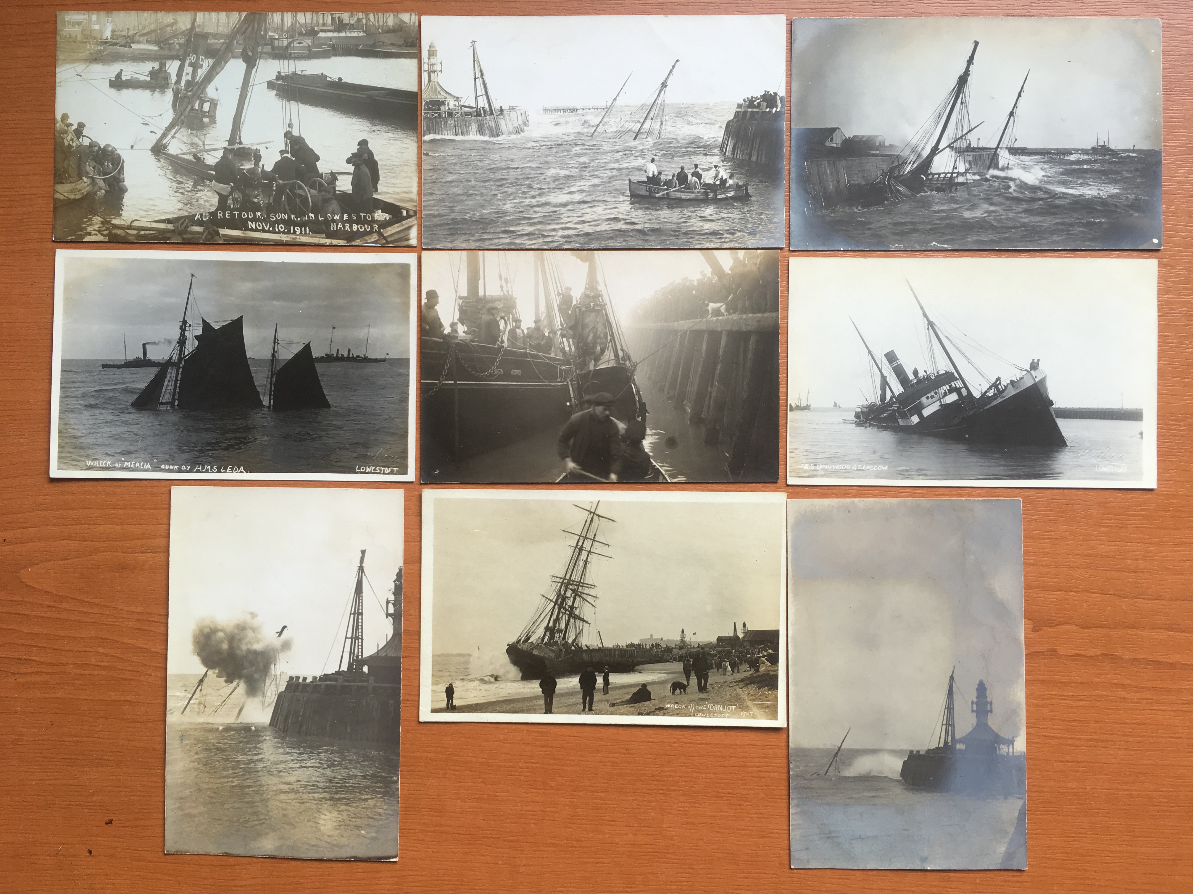 SUFFOLK: LOWESTOFT: RP POSTCARDS DEPICTING VARIOUS SUNKEN OR SHIPWRECKED TRAWLERS,