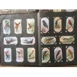 BOX WITH A COLLECTION CIGARETTE CARDS IN FIVE ALBUMS AND LOOSE,