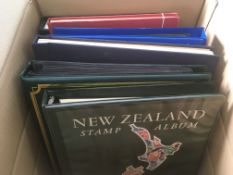 BOX WITH VARIOUS IN SEVEN VOLUMES, PRINTED ALBUMS OF NEW ZEALAND AND AUSTRALIA,