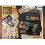 CHINA: FILE BOX WITH AN ACCUMULATION ON LEAVES, STOCKCARDS AND LOOSE, POSTAGE DUES, TAIWAN, ETC.