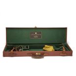 A LEATHER SINGLE GUNCASE, fitted for 28in. barrels (could adapt to 31in.), the interior lined with