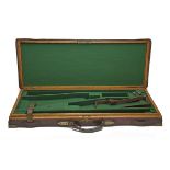 A BRASS-CORNERED OAK AND LEATHER DOUBLE GUNCASE, fitted for 28in. barrels (could adapt to 30in.),