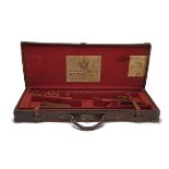 HOLLAND & HOLLAND A BRASS-CORNERED LEATHER DOUBLE GUNCASE, fitted for 30in. barrels, the interior