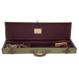 WILLIAM EVANS A CANVAS AND LEATHER SINGLE GUNCASE, fitted for 30in. barrels, the interior lined with