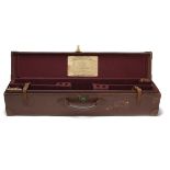 STEPHEN GRANT & JOSEPH LANG LTD. A LEATHER DOUBLE MOTORCASE, fitted for 30in. barrels, the