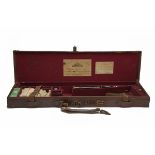 WILLIAM POWELL & SON A BRASS-CORNERED LEATHER SINGLE GUNCASE, fitted for 30in. barrels, the interior